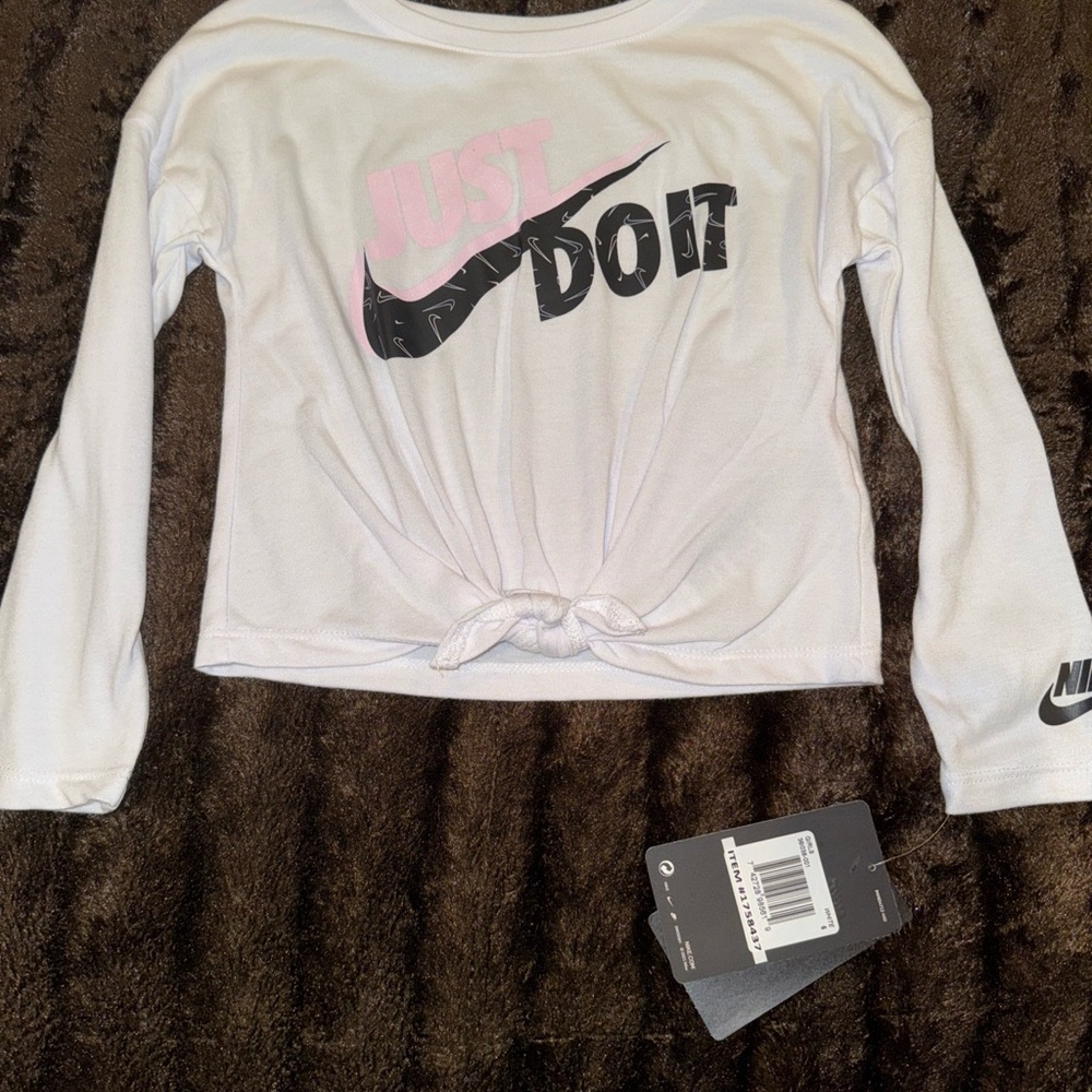 Nike Kids White Long Sleeve Tee with Pink and Black Slogan